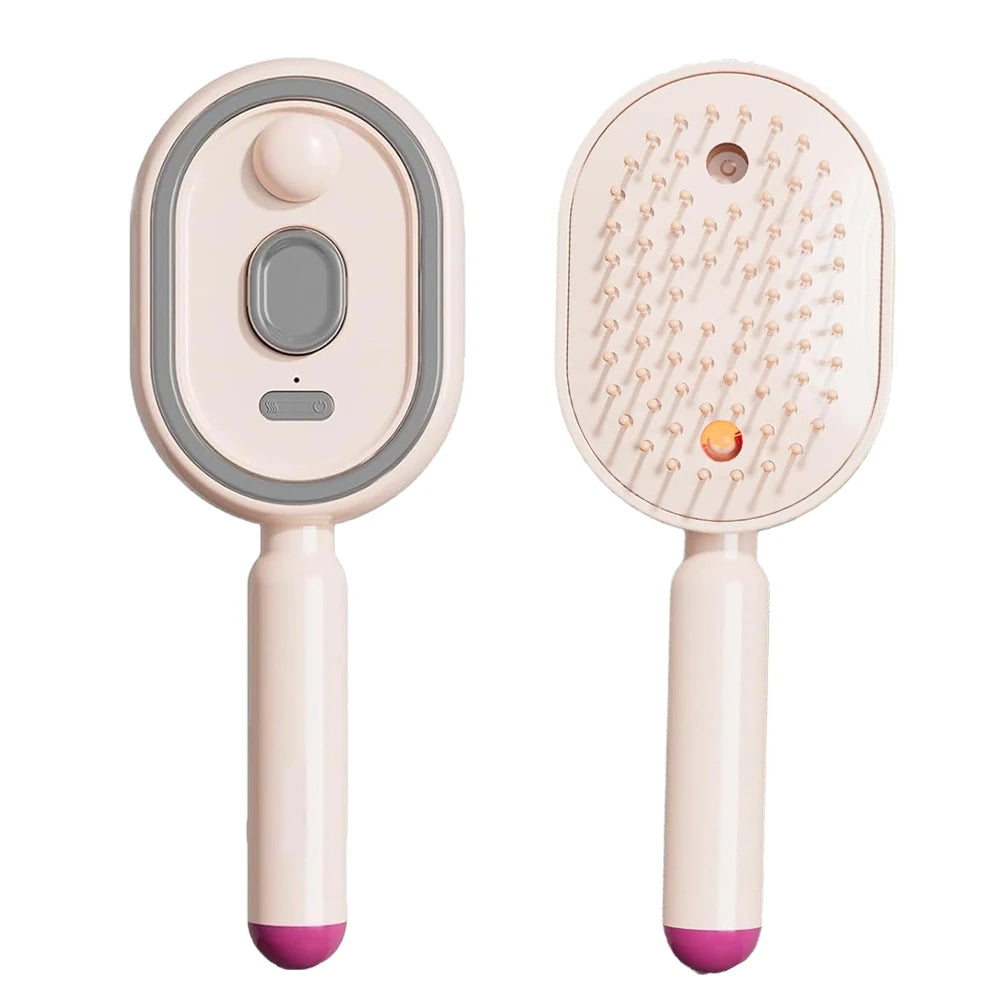 A pink rechargeable electric spray hair brush with a smooth body and a silicone brush head.
