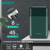 A dark green mini rechargeable electric beard shaver and trimmer with USB charging options.