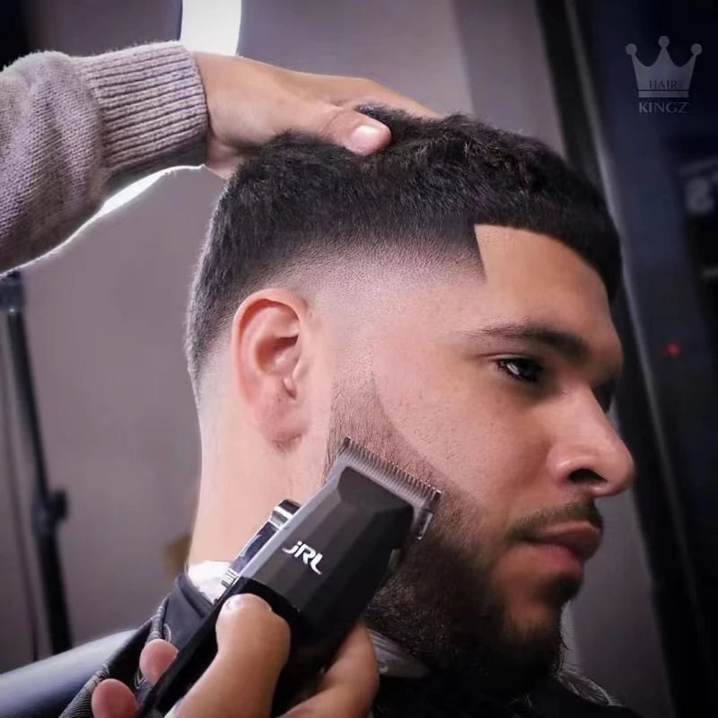 A man is using a professional rechargeable hair clipper on his haircut, with another hand adjusting his hair.