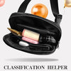 A black portable LED magnifying makeup mirror is shown with various cosmetic tools and a spherical light source.