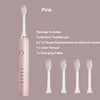 Pink sonic electric toothbrush package including one brush, four replacement heads, user manual, and charging cable.
