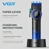 VGR taper lever hair trimmer with blue and black body shown next to its charging base