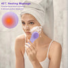 A woman uses a purple sonic facial cleansing brush on her face for heating massage and product absorption.