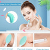 A woman is using a silicone facial cleansing brush set for skincare treatment.