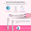 A pink electric toothbrush with blue bristles is shown alongside replacement brush heads and cleaning tips.