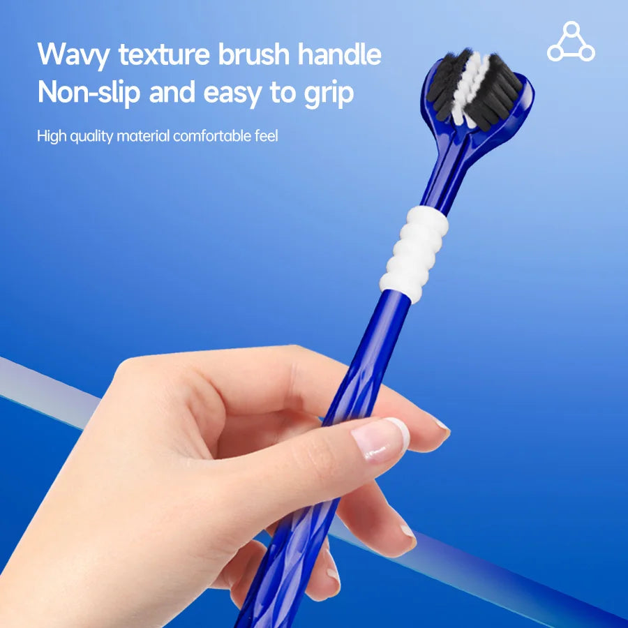 A hand holds a blue U-shaped toothbrush with a wavy texture brush handle and white grip.