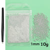 A clear plastic bag containing 10 grams of white 1mm stainless steel beads for nail art decorations.