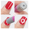 Un set de rotuladores de arte de uñas con diseños florales y de mariposa en rojo, blanco y morado.
