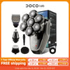 A black 5-in-1 multifunctional electric shaver and trimmer with multiple attachments shown on a white background.