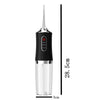 A black portable electric water flosser with a clear glass chamber and a silver nozzle, shown against a white background.