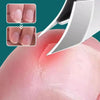 A stainless steel slant edge nail clipper is shown cutting a fingernail on a finger.