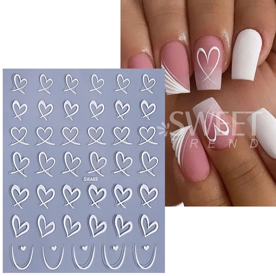 Un set de décals de cœur d'amour en résine pour ongles, dans les tons blanc et rose, pour manucure DIY