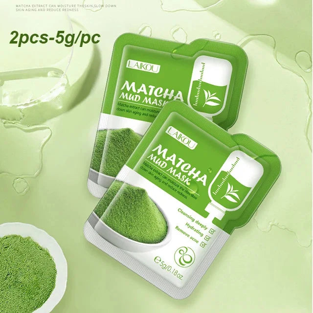 Two green matcha mud mask sticks packaged in a green holder with white labels and product information