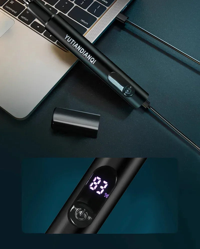 A black electric portable hair and nose trimmer is shown next to a laptop keyboard and a close-up view of its display.