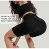 A woman wearing black EMS body shaper yoga pants is shown performing an exercise.