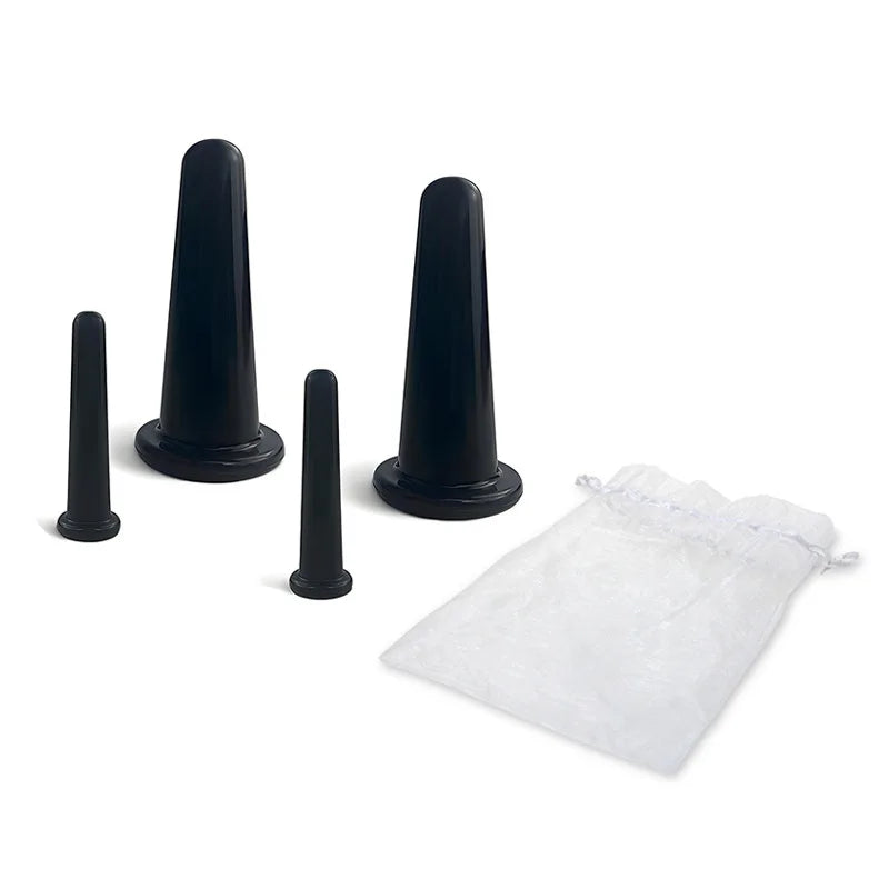 A set of black silicone facial cupping massage cones and a clear plastic bag for skin rejuvenation.