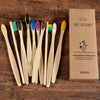 A box of 10-pack bamboo toothbrushes for adults with a graphic of a tree.