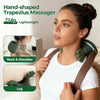 A woman is using a hand-shaped trapezius massager on her neck and shoulder area.