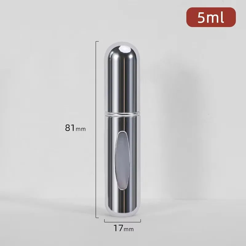 Flacon de parfum argenté rechargeable avec pompe à spray portable, vue verticale.