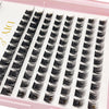 A tray of black bulk cluster eyelash extensions for DIY makeup application.