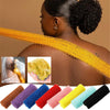 A woman shows a yellow exfoliating bath sponge washcloth draped over her shoulder, with various colored sponges displayed bel