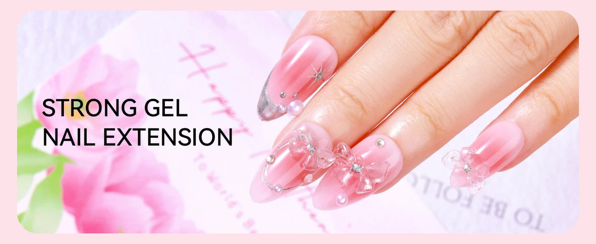 A hand displays a pink gel nail extension with glitter accents, showcasing the strong gel nail extension product.