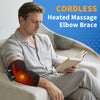 A man is wearing a red heated massage elbow brace while reading a book.