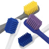 A set of silicone toothbrushes in yellow and purple colors shown on a gray background.