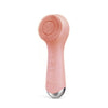 A pink 360° rotating USB facial cleansing brush with a textured silicone head.