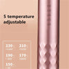 A close-up of a pink ceramic hair curling iron showing temperature settings from 150°C to 230°C.