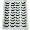 Un plateau en plastique contenant un ensemble de faux cils à bande de renard naturels pour usage cosmétique.