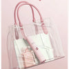 A clear pink double-head electric epilator bag with pink handles and a pink product inside.
