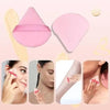 A set of 15 makeup sponges in various shades and shapes, including pink and beige, shown with product packaging.