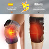 A close-up of an electric knee massager and heat therapy pad applied to a person's knee.