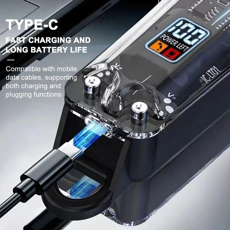Close-up of a black cordless hair clipper charging via a Type-C cable, showing the power indicator.