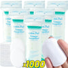A collection of premium cotton pads for makeup removal and face cleaning, shown next to a white cotton pad.