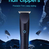 A black electric hair clipper is shown against a dark, icy background with blue light effects.
