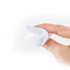 A hand holds a white reusable velvet powder puff set.