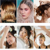 A collection of metal U-shaped hair pins used for styling various hairstyles on a woman's hair.
