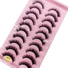 Un plateau en plastique rose contenant divers styles de faux cils de renard.