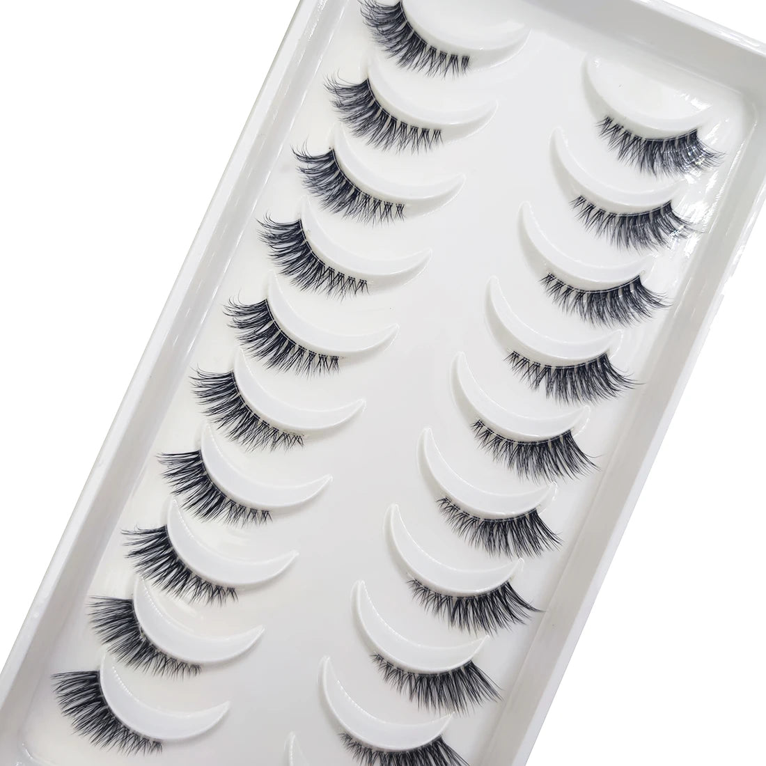 A tray of natural 3D mink false eyelashes in various styles and lengths.