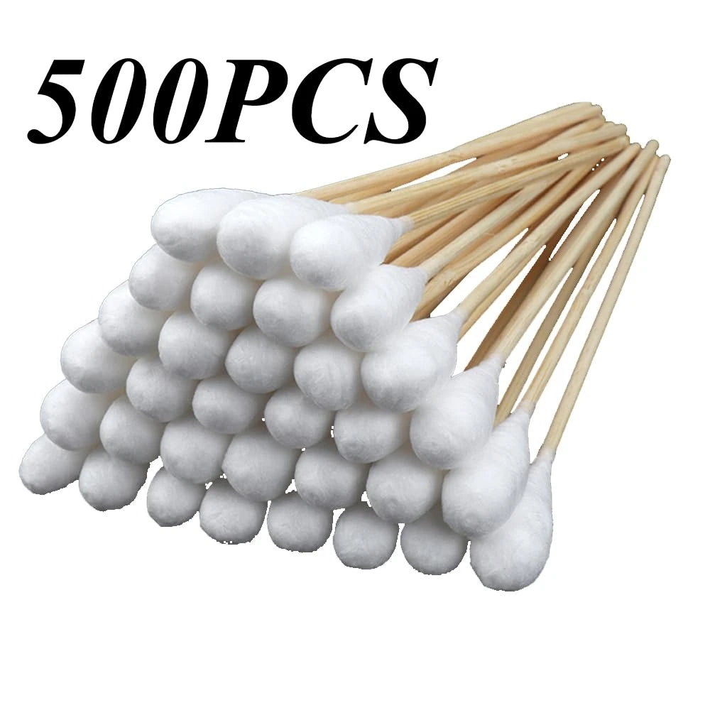 A bundle of 500 precision wooden cotton swabs with white cotton tips.