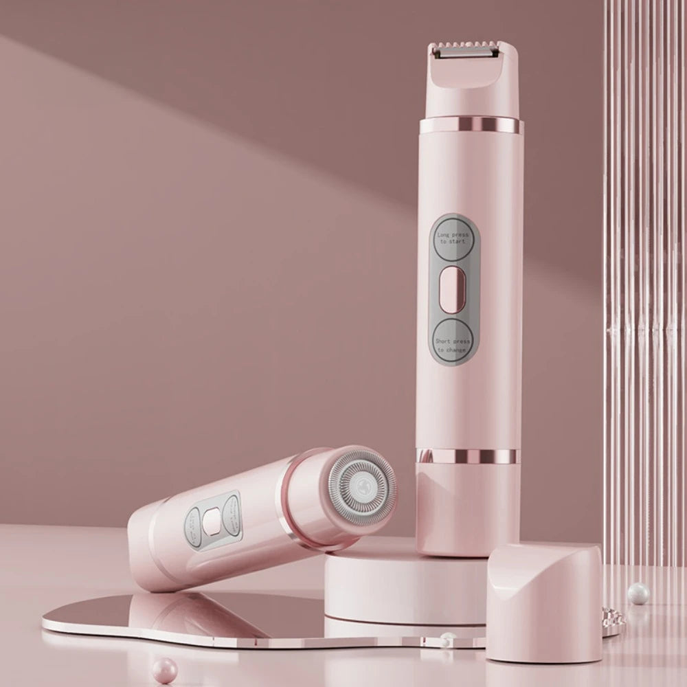 A pink portable electric body hair trimmer standing upright on a glass surface.