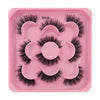 A pink tray holding a set of black artificial mink eyelashes for eye extensions.