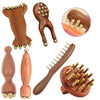 A set of natural wood facial and scalp massage combs showing various shapes and sizes.