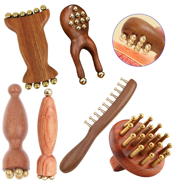 A set of natural wood facial and scalp massage combs showing various shapes and sizes.