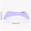 A purple precision spring-action facial hair remover tool shown against a white background.
