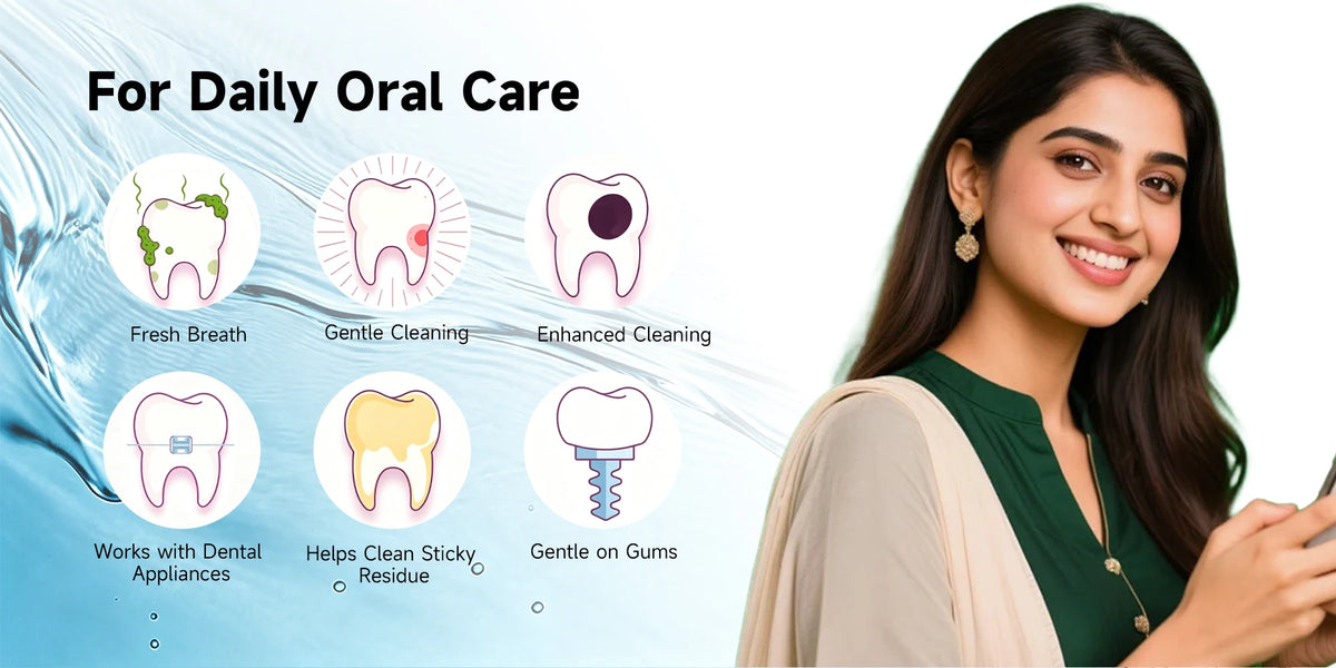 A woman smiling while using a portable water flosser oral irrigator for daily oral care.