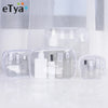 Clear waterproof travel cosmetic bags containing various liquid and solid toiletries