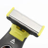 A close-up view of a portable electric shaver with a yellow handle and silver shaving head.